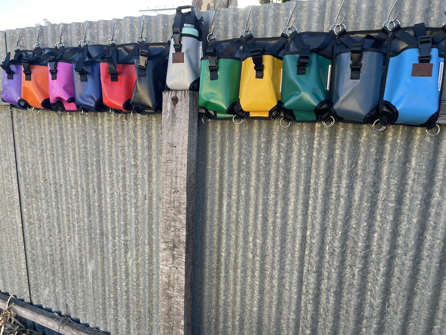 Water bottle holder for saddle or motorbike