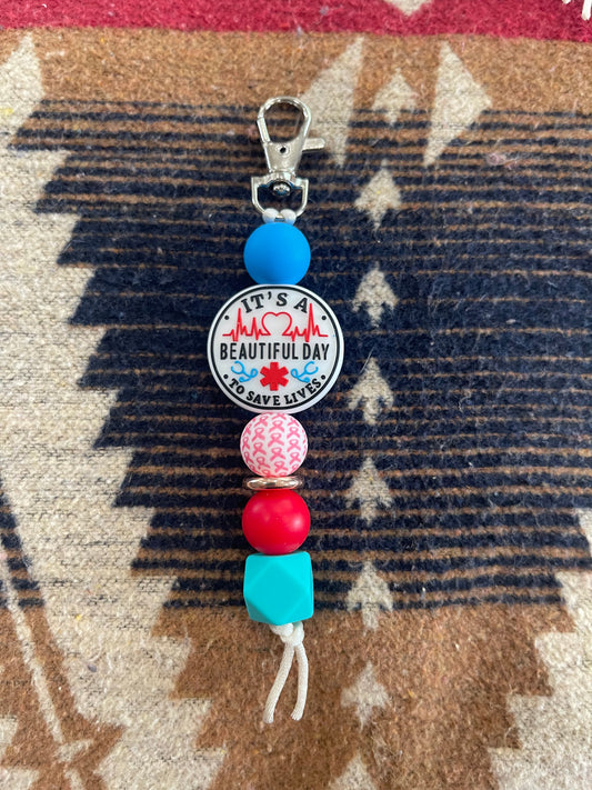 Keyring, beaded - it’s a beautiful day to save lives