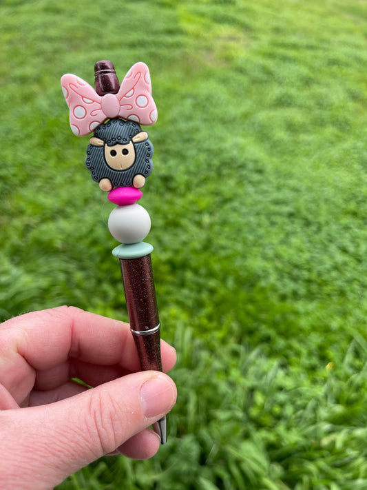 Tizzied up black sheep of the family brown beaded pen